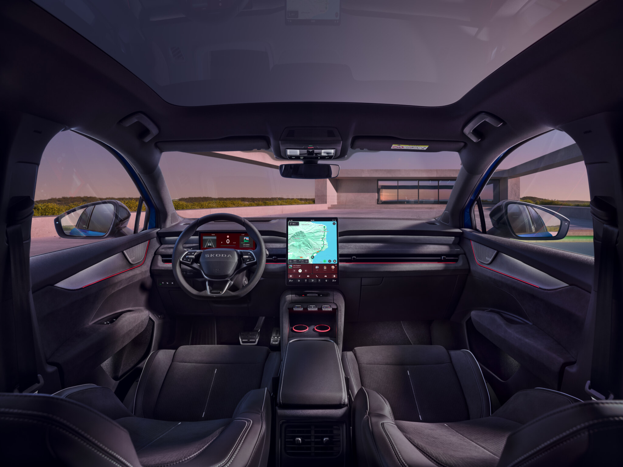 Sportline Lounge with front sport seats upholstered in a combination of Techtona and Suedia materials, both in black, accented by contrasting white stitching.