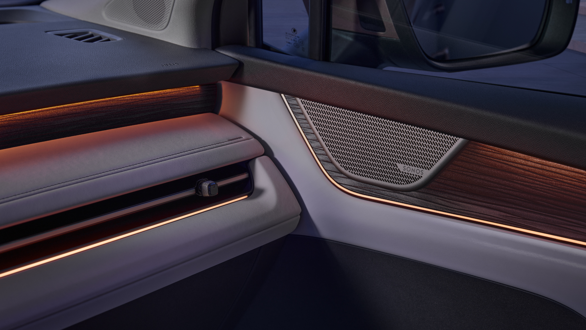 The metal speaker grilles of the Sonos sound system in the doors are designed to promote optimal sound distribution throughout the interior